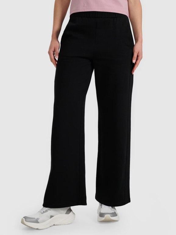 Damskie spodnie dresowe z szerokimi nogawkami 4F 4FRAW25TTROF1614 - czarne