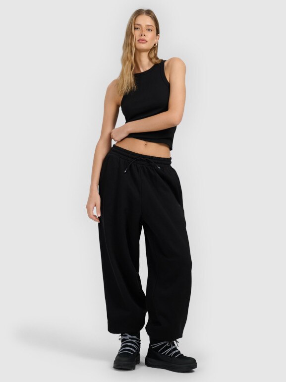 Damskie spodnie dresowe joggery 4F 4FRAW25TTROF1706 - czarne