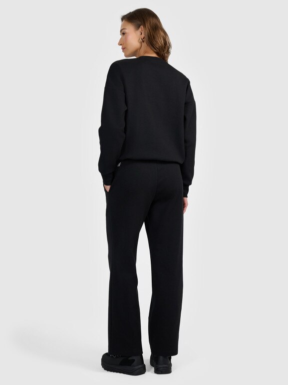 Damskie spodnie dresowe z szerokimi nogawkami 4F 4FRAW25TTROF1919 - czarne