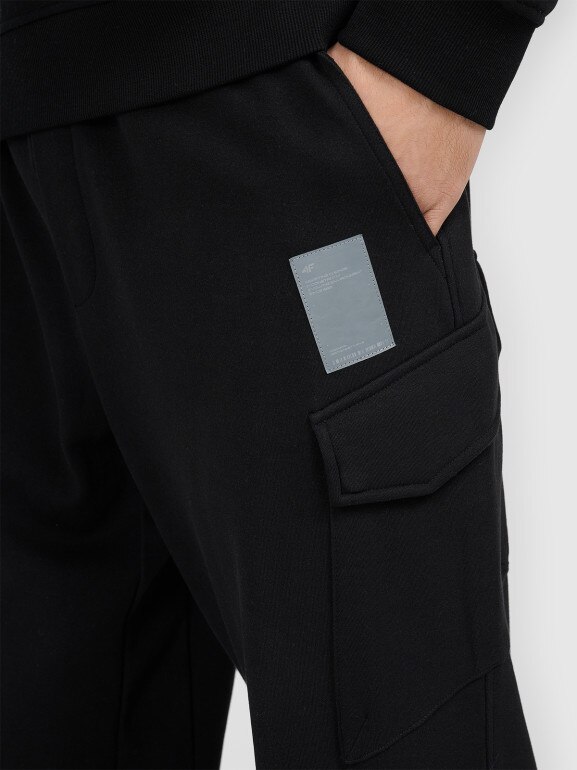 Męskie spodnie dresowe joggery 4F 4FRAW25TTROM1694 - czarne