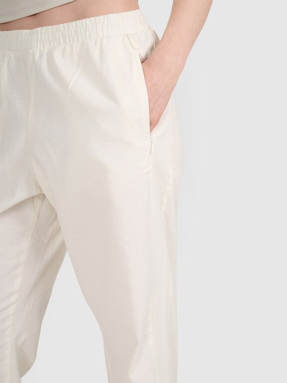 Damskie spodnie casual 4F 4FRSS25TTROF1448 - białe