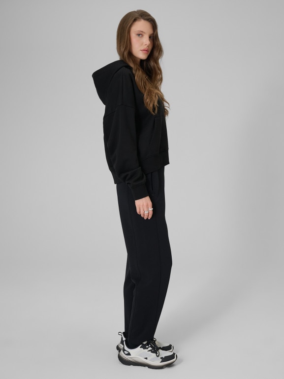 Damskie spodnie dresowe joggery 4F 4FRSS26TTROF1885 - czarne