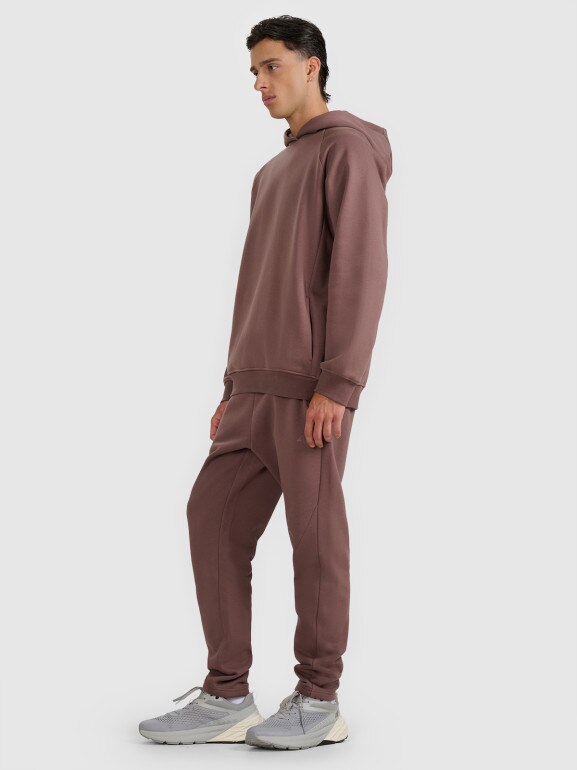 Męskie spodnie dresowe 4F 4FWAW25TTROM1251 - brązowe