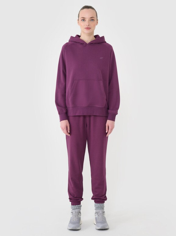 Damskie spodnie dresowe joggery 4F 4FWSS25TTROF0993 - fioletowe