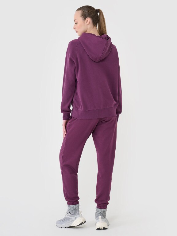 Damskie spodnie dresowe joggery 4F 4FWSS25TTROF0993 - fioletowe