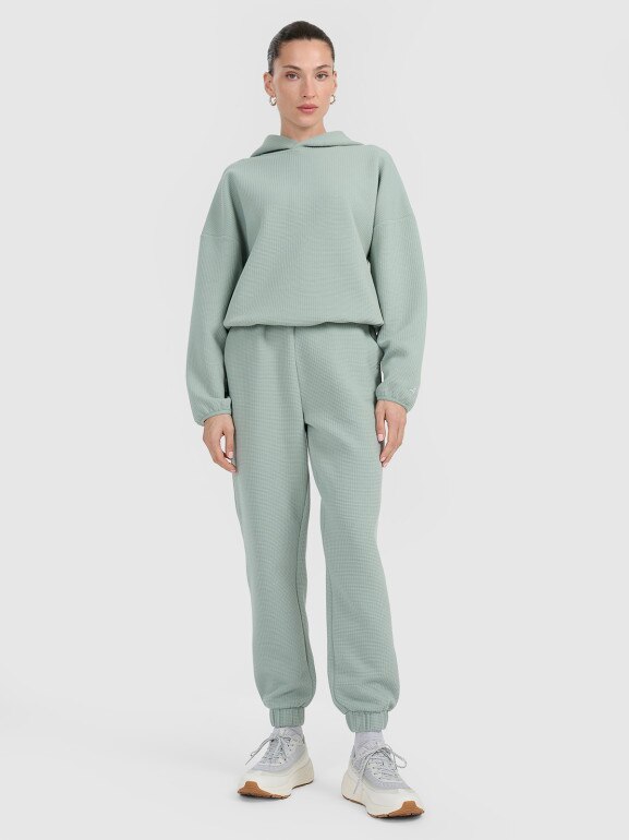 Damska bluza dresowa nierozpinana z kapturem 4F 4FWAW25TSWSF1847 - zielona