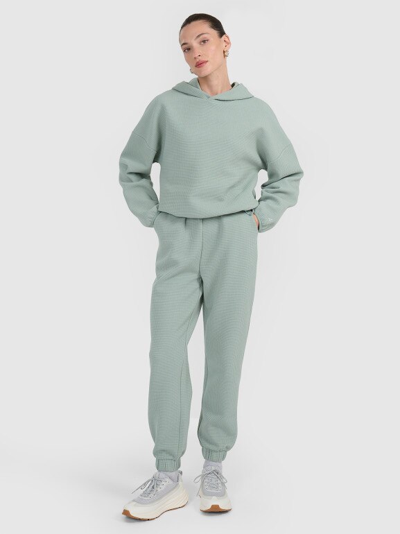 Damska bluza dresowa nierozpinana z kapturem 4F 4FWAW25TSWSF1847 - zielona