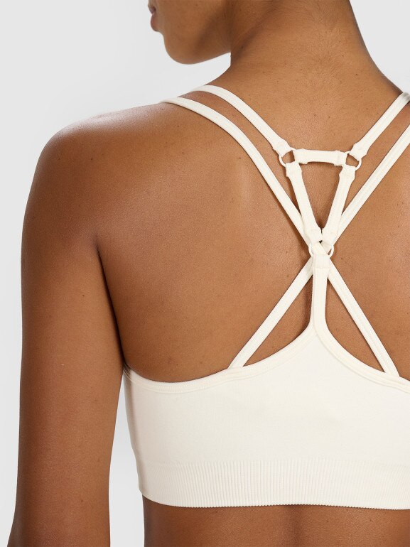 Damski biustonosz treningowy 4F 4FWAW25USBAF218 - beżowy