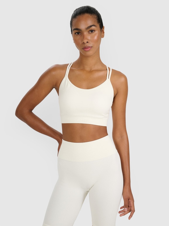 Damski biustonosz treningowy 4F 4FWAW25USBAF218 - beżowy