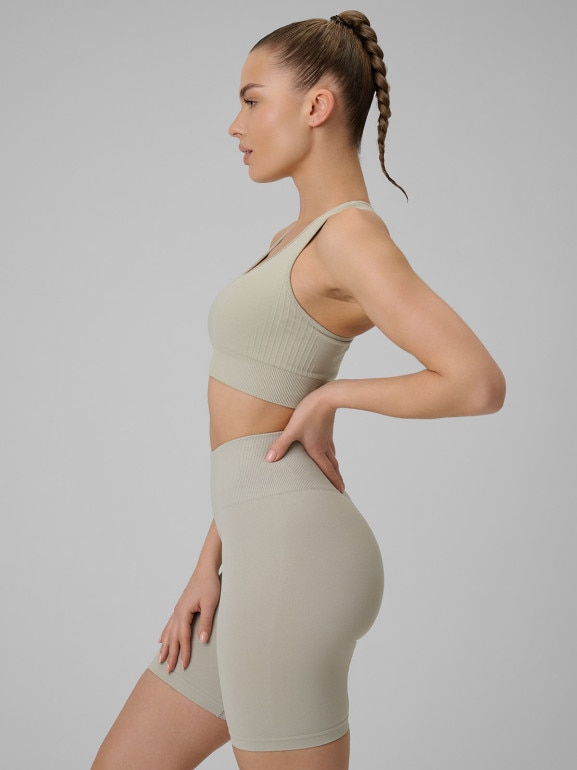 Damski biustonosz treningowy 4F 4FWSS26USBAF242 - beżowy