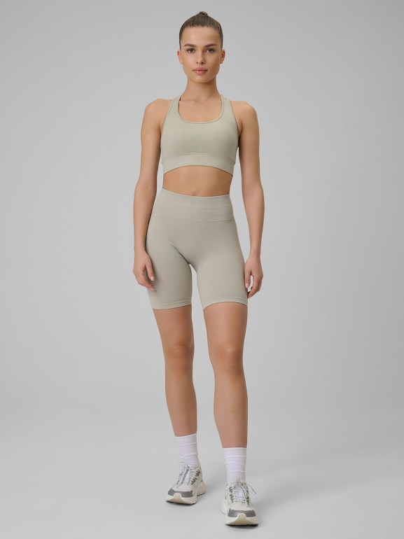 Damski biustonosz treningowy 4F 4FWSS26USBAF242 - beżowy