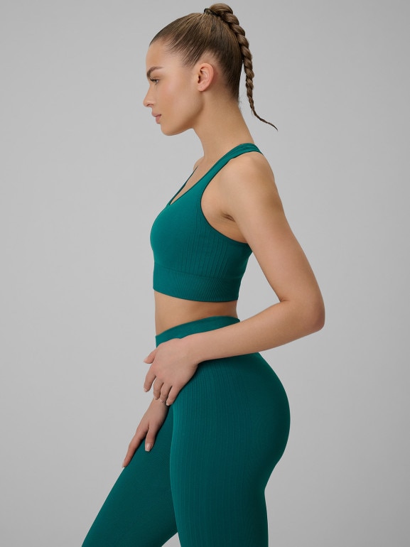 Damski biustonosz treningowy 4F 4FWSS26USBAF242 - turkusowy