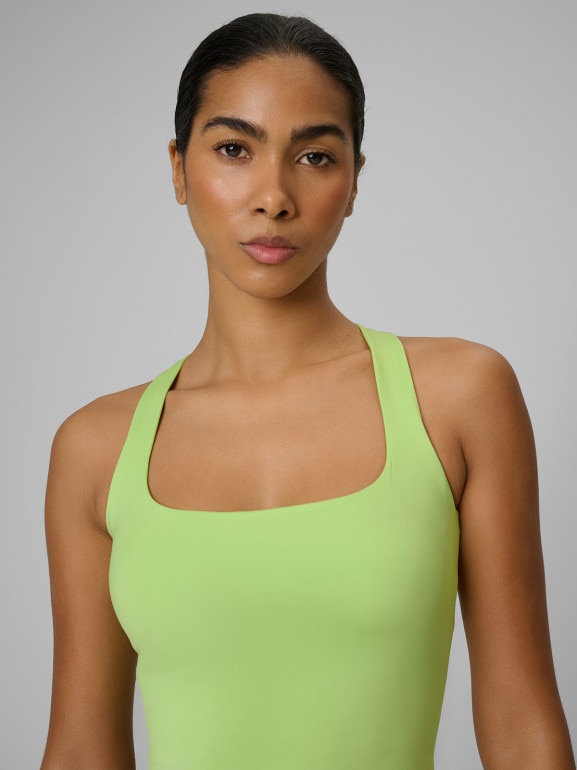 Damski crop-top treningowy 4F 4FWSS26TFSLF0751 - limonkowy