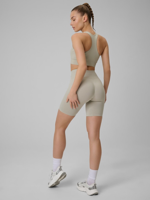 Damskie legginsy kolarki treningowe 4F 4FWSS26TFSTF109 - beżowe