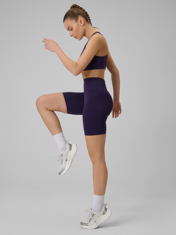 Damskie legginsy kolarki treningowe 4F 4FWSS26TFSTF109 - fioletowe