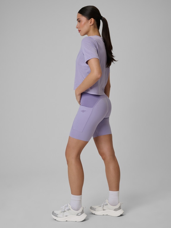 Damskie legginsy krótkie treningowe 4F 4FWSS26TFSTF071 - fioletowe