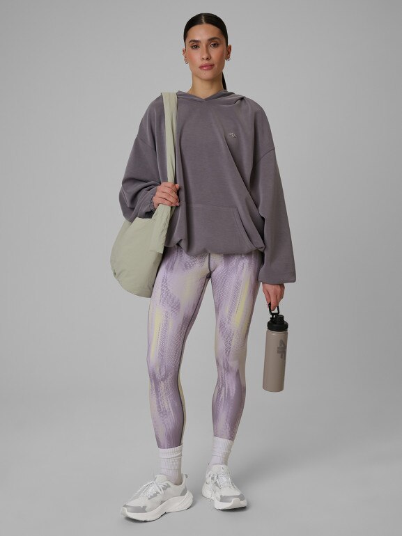 Damskie legginsy treningowe 4F 4FWSS26TFTIF454 - fioletowe