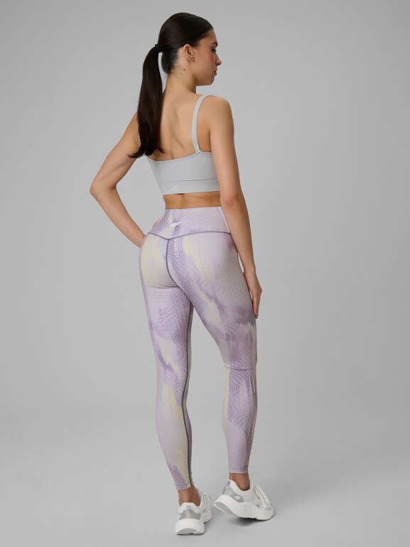Damskie legginsy treningowe 4F 4FWSS26TFTIF454 - fioletowe