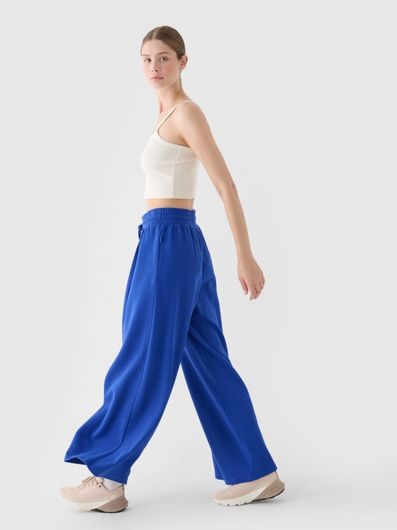 Damskie spodnie dresowe 4F 4FRSS24TTROF1331 - niebieskie