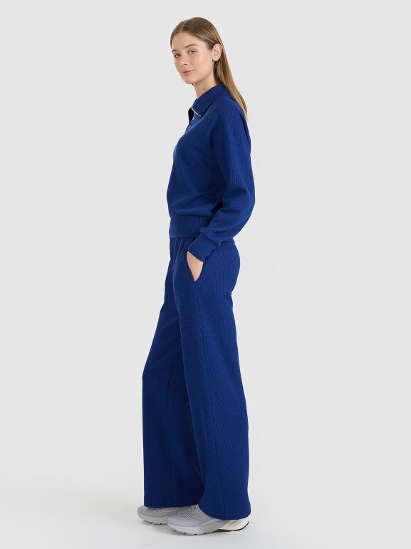 Damskie spodnie dresowe 4F 4FRSS25TTROF1397 - niebieskie