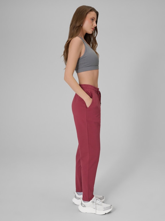 Damskie spodnie dresowe 4F 4FRSS26TTROF1851 - burgundowe