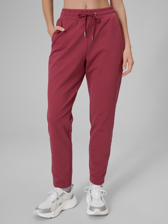 Damskie spodnie dresowe 4F 4FRSS26TTROF1851 - burgundowe