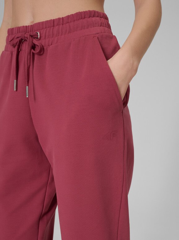 Damskie spodnie dresowe 4F 4FRSS26TTROF1851 - burgundowe