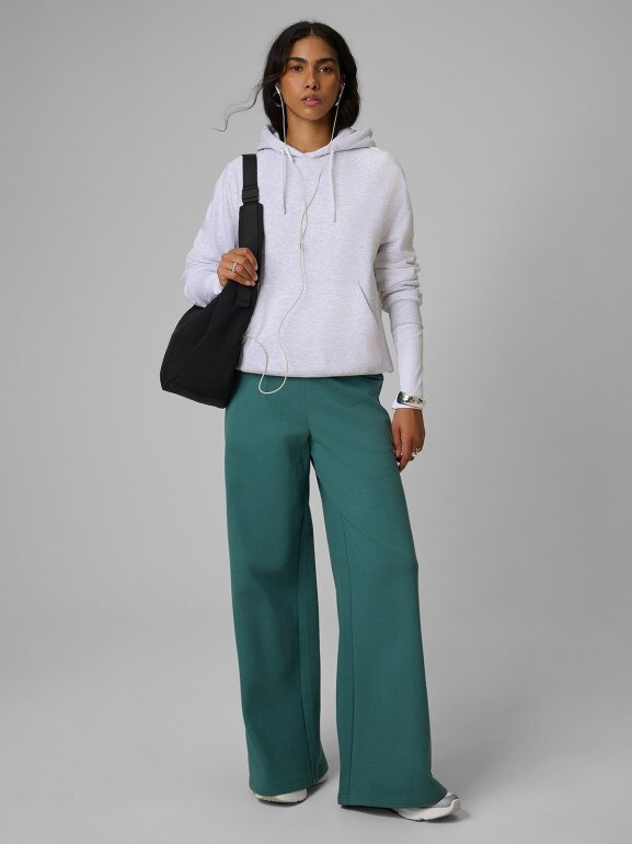 Damskie spodnie dresowe 4F 4FRSS26TTROF2011 - turkusowe