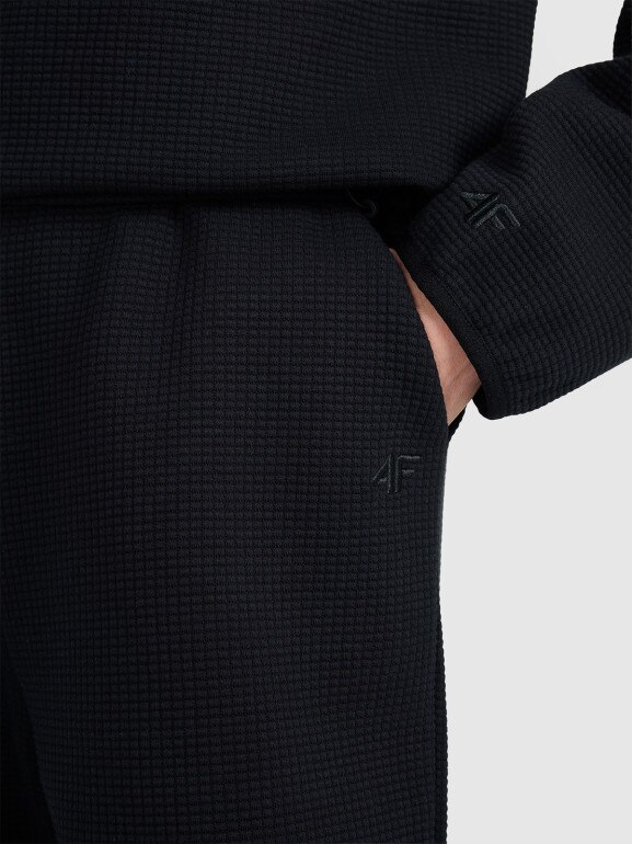 Damskie spodnie dresowe 4F 4FWAW25TTROF1184 - czarne