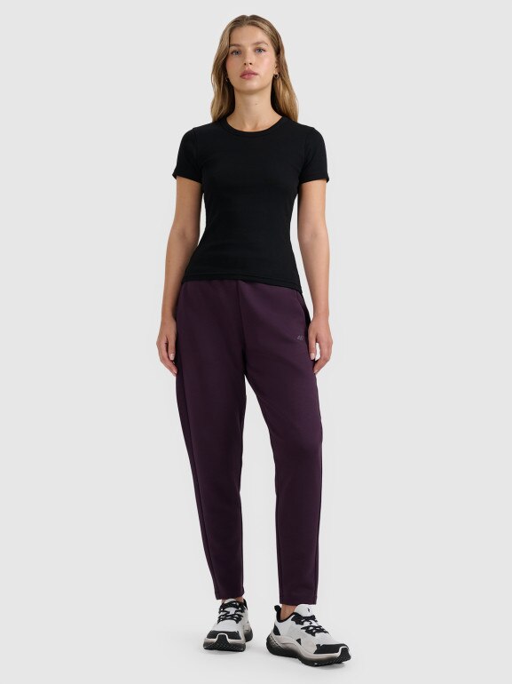 Damskie spodnie dresowe 4F 4FWAW25TTROF1197 - fioletowe