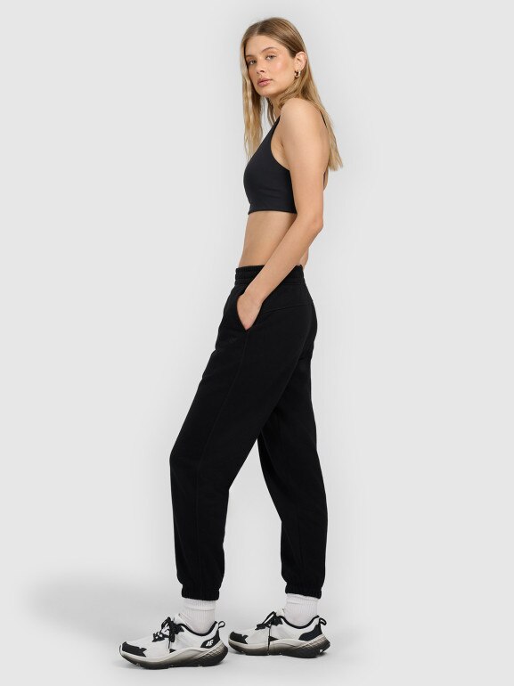 Damskie spodnie dresowe joggery 4F 4FRMM00TTROF1842 - czarne