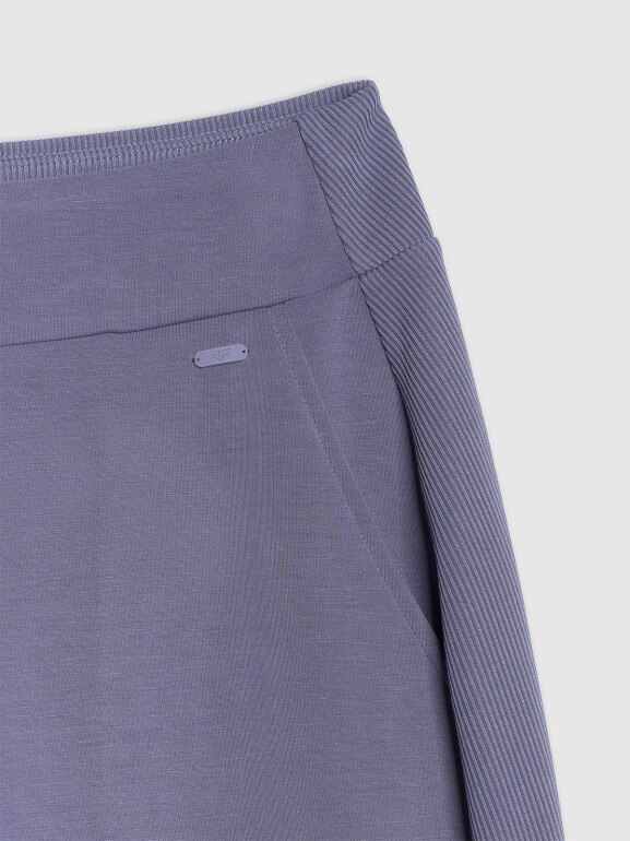 Damskie spodnie dresowe joggery 4F 4FWAW25TTROF1180 - niebieskie