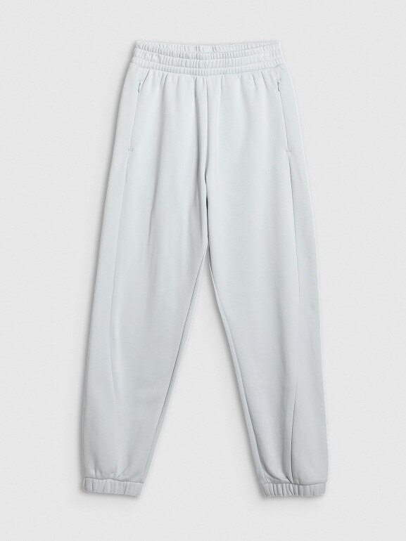 Damskie spodnie dresowe joggery 4F 4FWAW25TTROF1185 - niebieskie