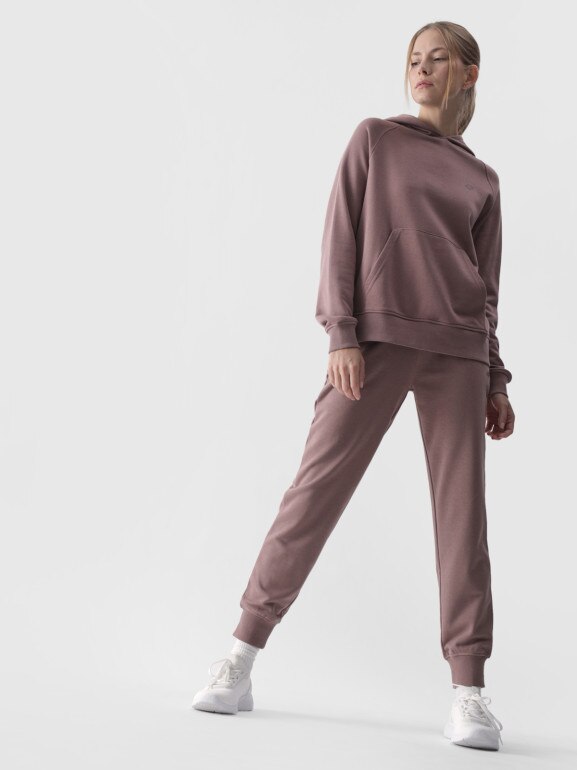 Damskie spodnie dresowe joggery 4F 4FWMM00TTROF0945 - beżowe