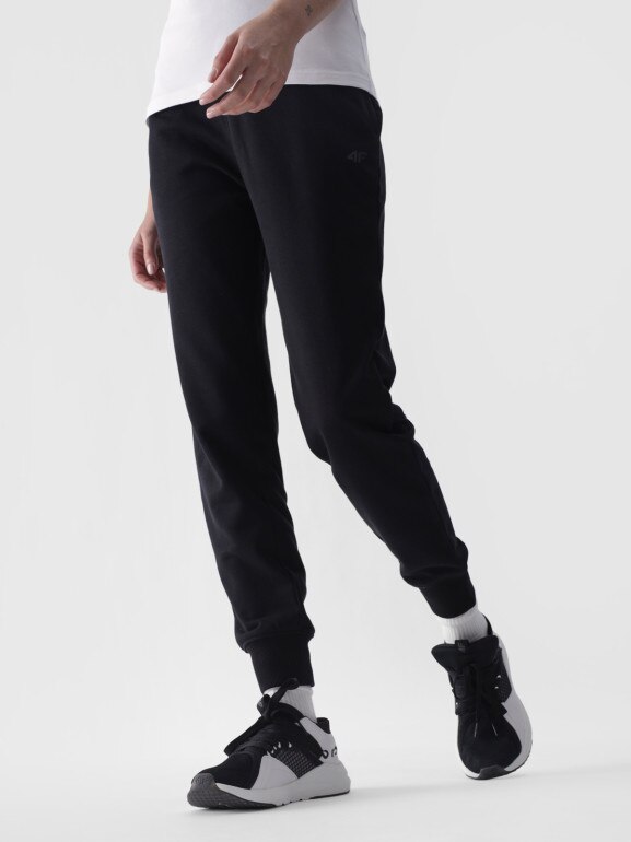 Damskie spodnie dresowe joggery 4F 4FWMM00TTROF0945 - czarne