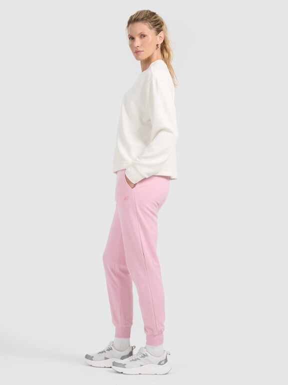Damskie spodnie dresowe joggery 4F 4FWMM00TTROF0945 - różowe