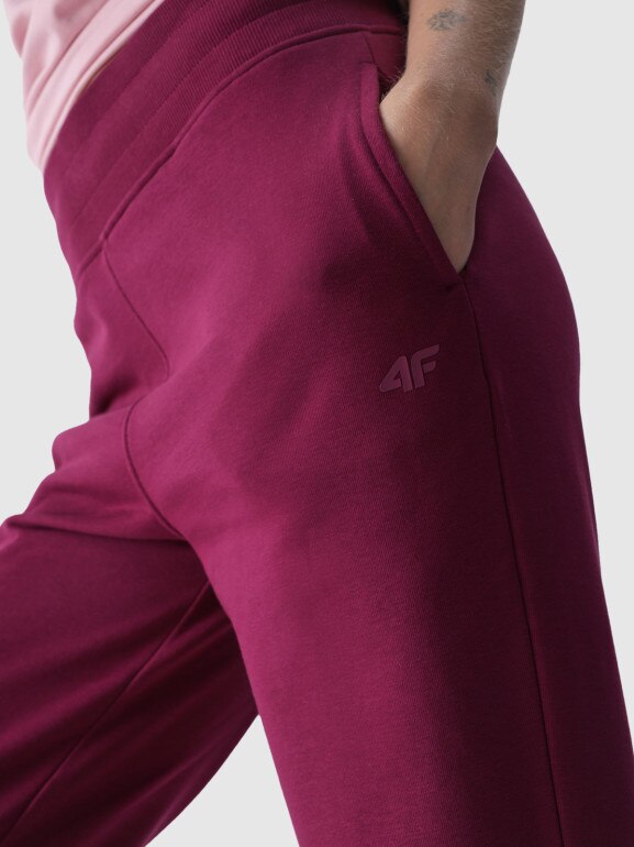 Damskie spodnie dresowe joggery 4F 4FWMM00TTROF0945 - różowe