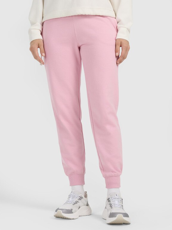 Damskie spodnie dresowe joggery 4F 4FWMM00TTROF0945 - różowe