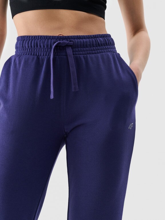 Damskie spodnie dresowe joggery 4F 4FWMM00TTROF1138 - granatowe