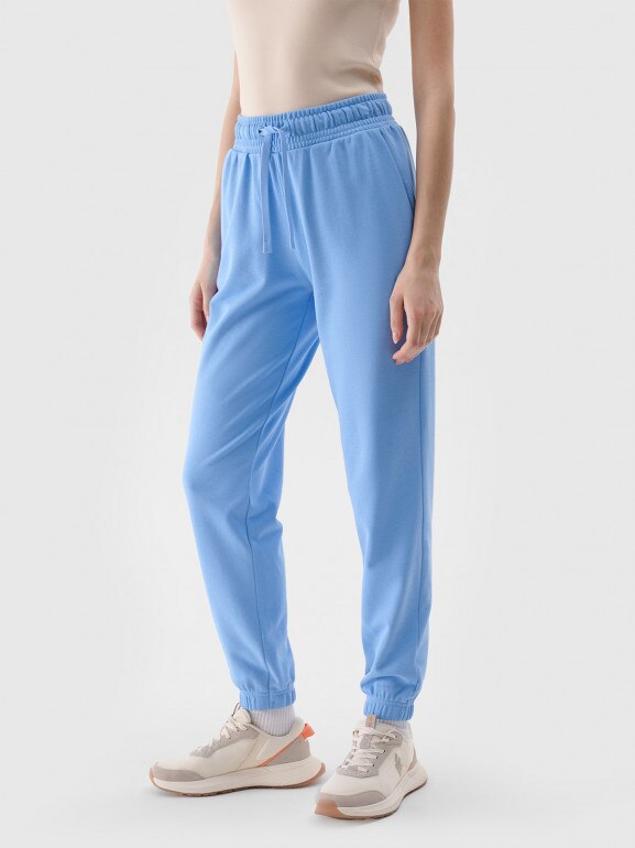 Damskie spodnie dresowe joggery 4F 4FWMM00TTROF1138 - niebieskie 
