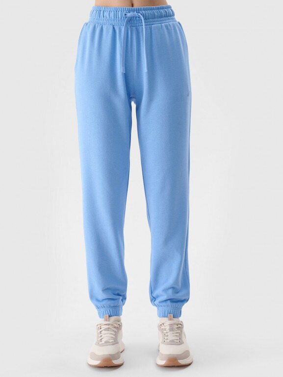 Damskie spodnie dresowe joggery 4F 4FWMM00TTROF1138 - niebieskie 