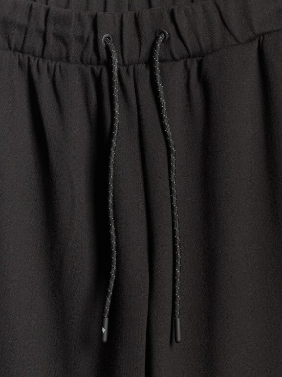 Damskie spodnie dresowe joggery 4F 4FWSS26TTROF1412 - czarne