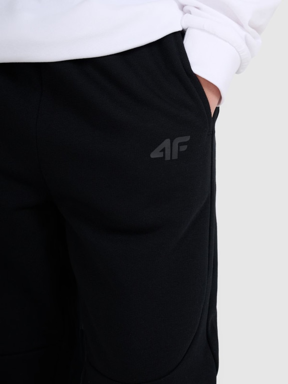 Chłopięce spodnie dresowe joggery 4F 4FJWAW25TTROM1257 - czarne