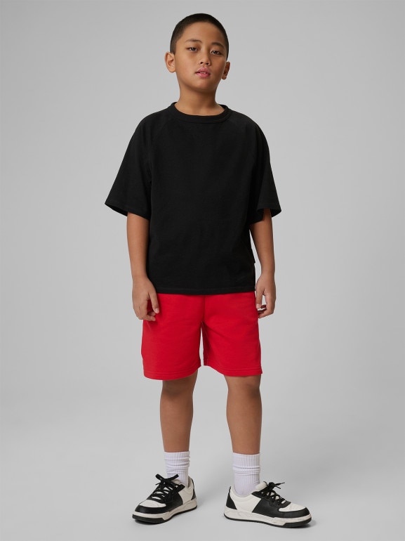 Chłopięce spodenki dresowe 4F 4FJWSS26TSHOM780 - czerwone