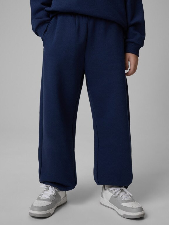 Chłopięce spodnie dresowe 4F 4FJRSS26TTROM1731 - granatowe