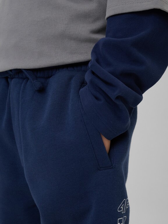 Chłopięce spodnie dresowe 4F 4FJRSS26TTROM1733 - granatowe