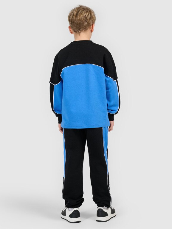 Chłopięce spodnie dresowe joggery 4F 4FJRSS26TTROM1873 - czarne