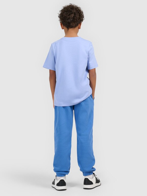 Chłopięce spodnie dresowe joggery 4F 4FJWSS26TTROM1506 - niebieskie