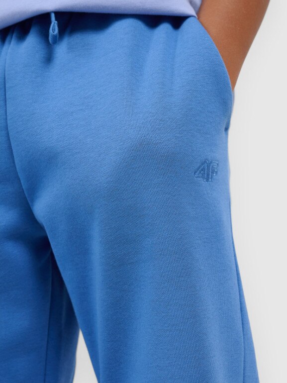 Chłopięce spodnie dresowe joggery 4F 4FJWSS26TTROM1506 - niebieskie