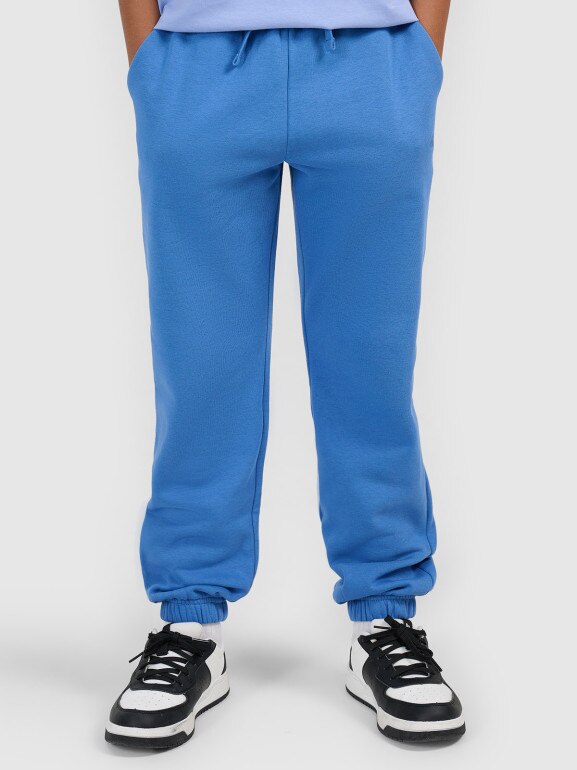 Chłopięce spodnie dresowe joggery 4F 4FJWSS26TTROM1506 - niebieskie